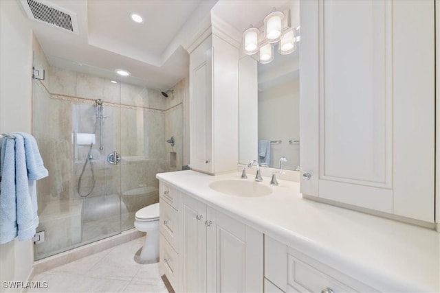 bathroom with toilet, vanity, tile patterned floors, and a shower with door