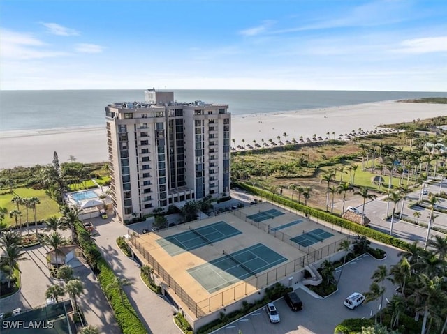 drone / aerial view with a view of the beach and a water view