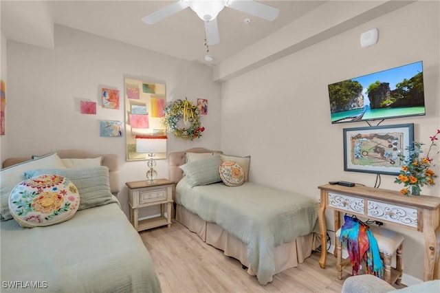 bedroom featuring light hardwood / wood-style floors and ceiling fan