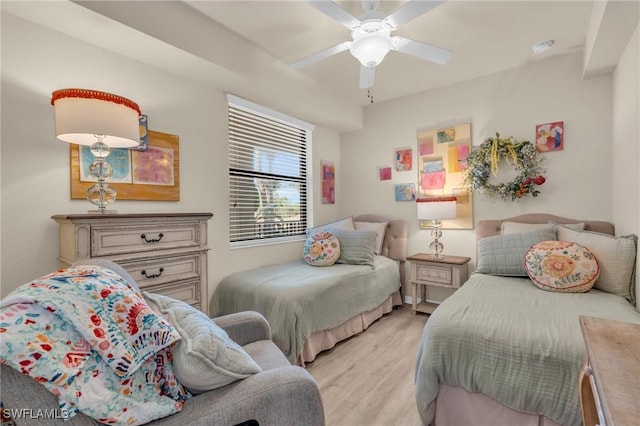 bedroom featuring ceiling fan and light wood-type flooring