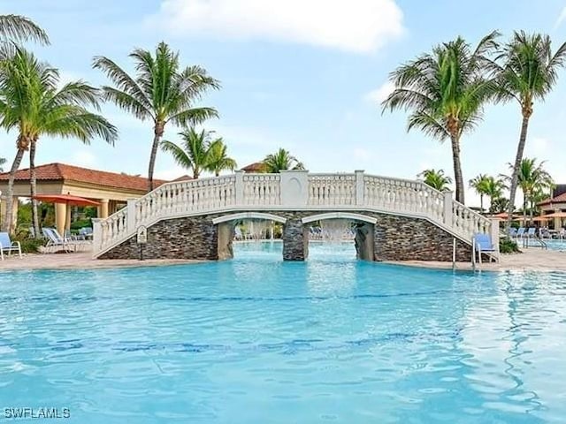 view of pool featuring pool water feature