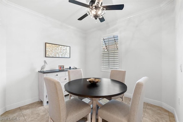 dining area with light tile patterned floors and ornamental molding