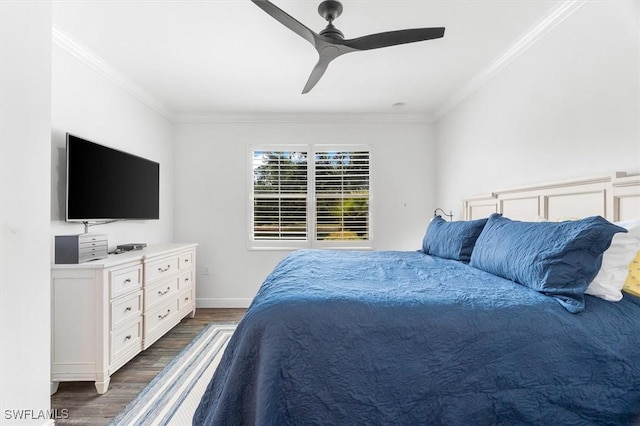 bedroom featuring ceiling fan, ornamental molding, and dark hardwood / wood-style floors