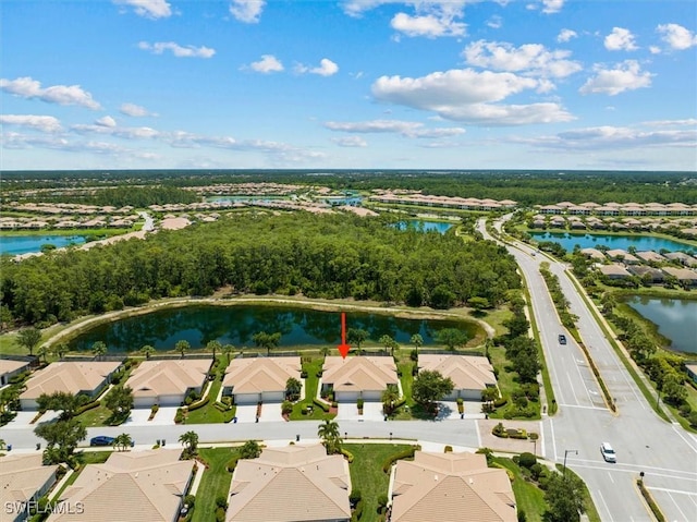 birds eye view of property featuring a water view