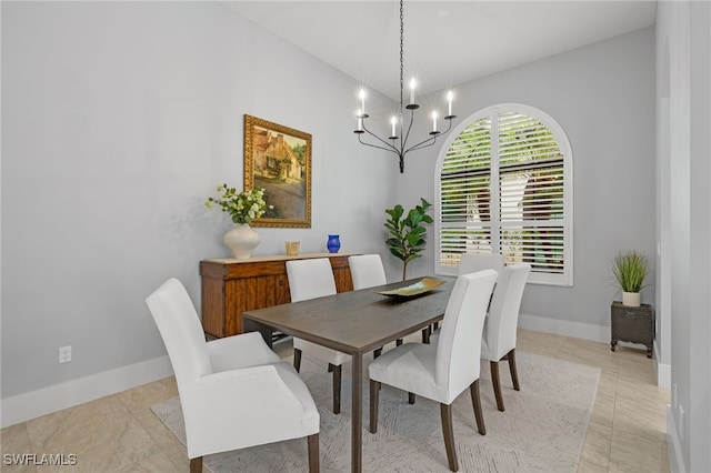 dining room with a chandelier