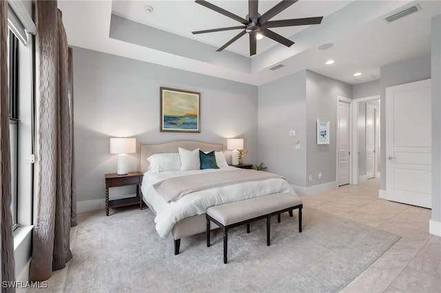 bedroom featuring a tray ceiling