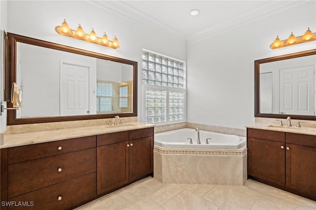 bathroom featuring tiled tub, vanity, and crown molding