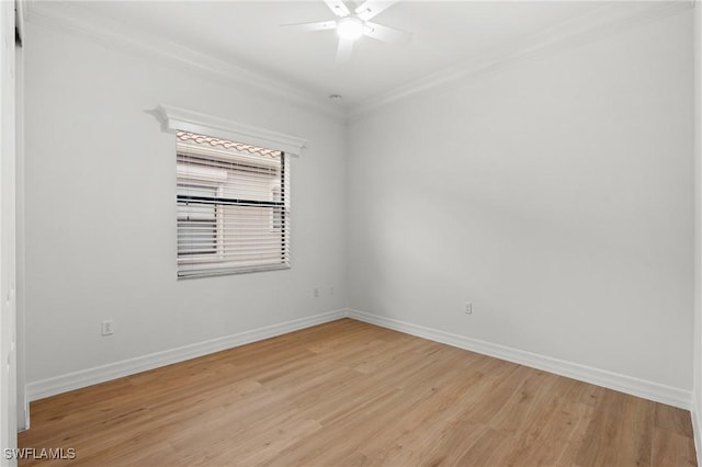 empty room with ceiling fan, crown molding, and light wood-type flooring