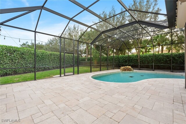 view of pool featuring a patio area and a lanai