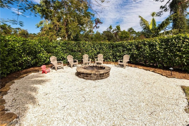 view of patio featuring a fire pit