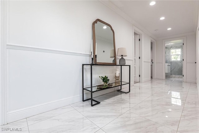 corridor featuring ornamental molding