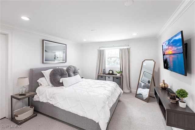 carpeted bedroom with ornamental molding