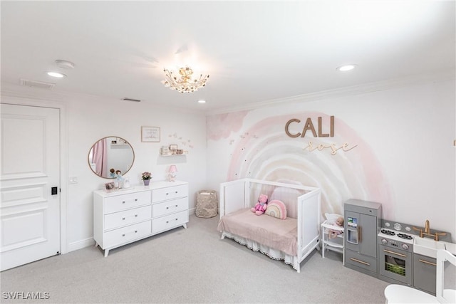 bedroom featuring ornamental molding and carpet