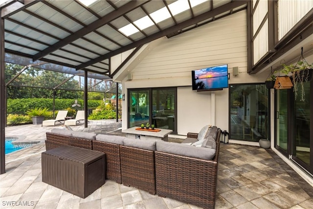 view of patio / terrace featuring outdoor lounge area and a lanai