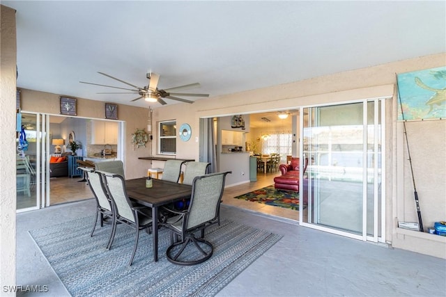 dining room with ceiling fan