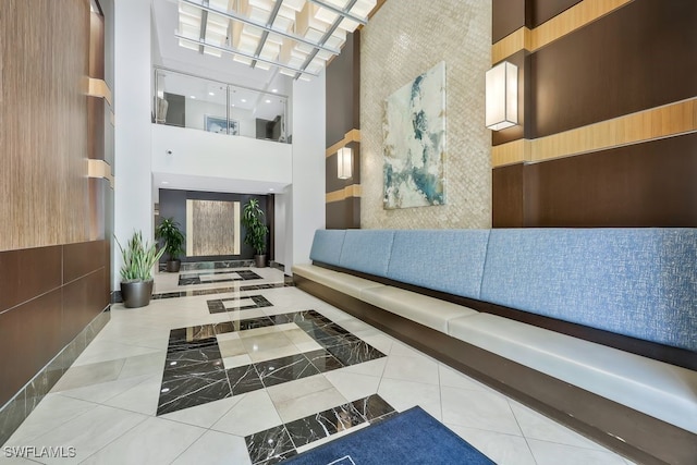 community lobby featuring a high ceiling