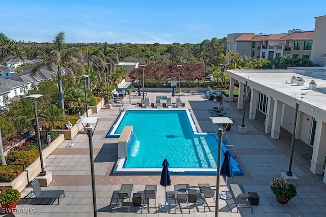 community pool with a patio