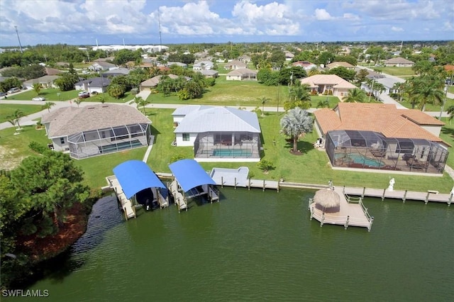 drone / aerial view with a water view