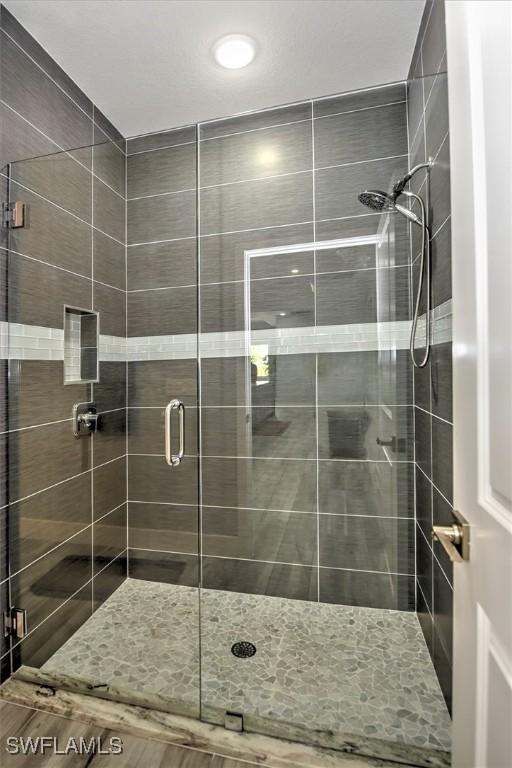 bathroom featuring walk in shower