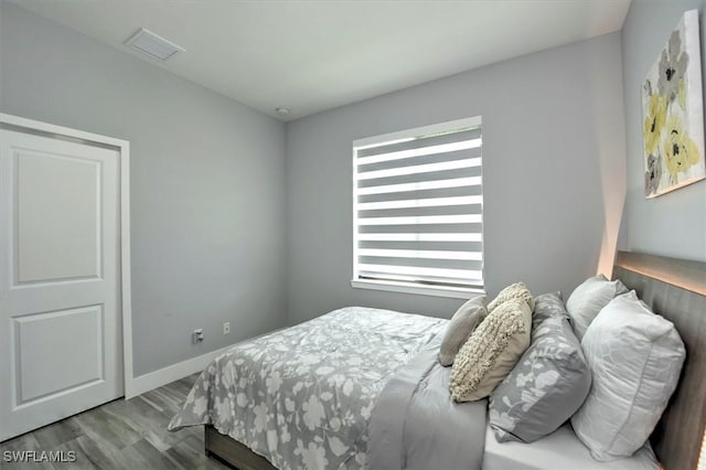 bedroom featuring light hardwood / wood-style floors