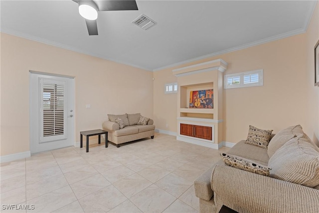 living room featuring ceiling fan, built in features, and crown molding