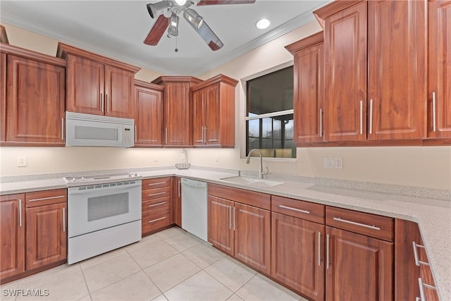 kitchen featuring white appliances, sink, light stone counters, light tile patterned floors, and crown molding