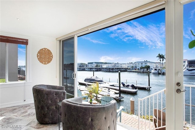 sunroom with a water view