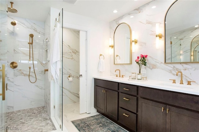 bathroom featuring vanity and a tile shower