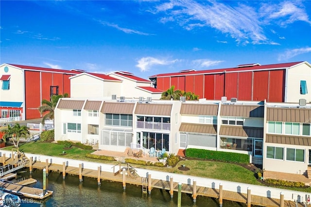 view of building exterior with a water view