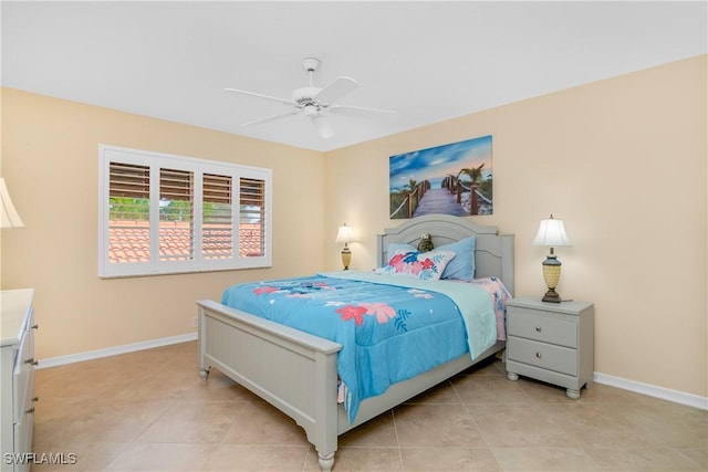 tiled bedroom with ceiling fan