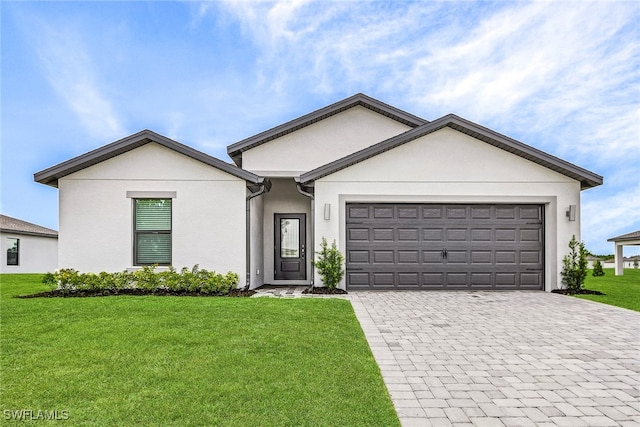 ranch-style home with a garage and a front yard