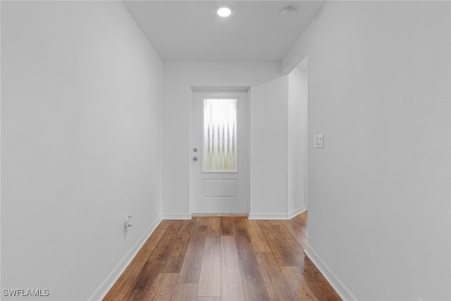 spare room with light hardwood / wood-style flooring