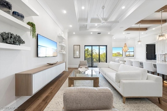 living room featuring crown molding, coffered ceiling, beam ceiling, and dark hardwood / wood-style flooring