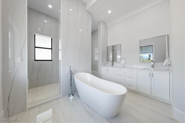 bathroom featuring plus walk in shower and vanity