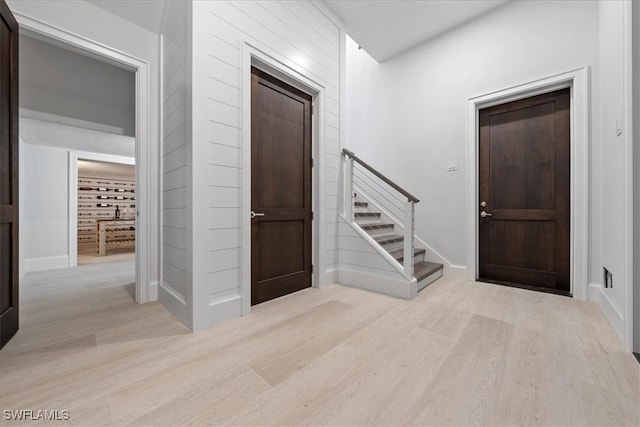 entryway with light hardwood / wood-style flooring