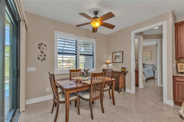 dining area featuring ceiling fan