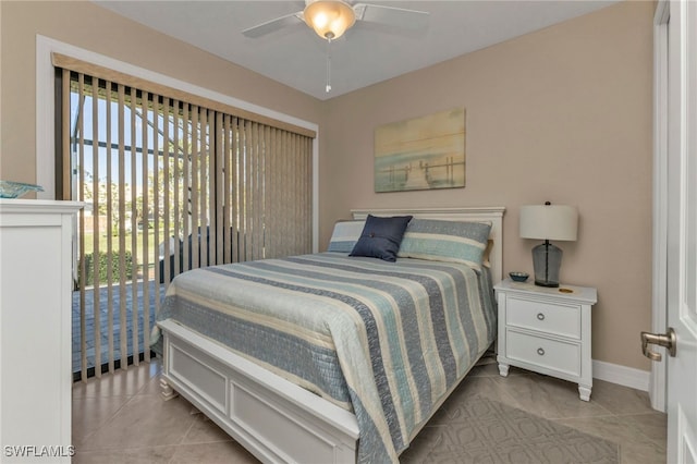 bedroom featuring ceiling fan and light tile patterned floors