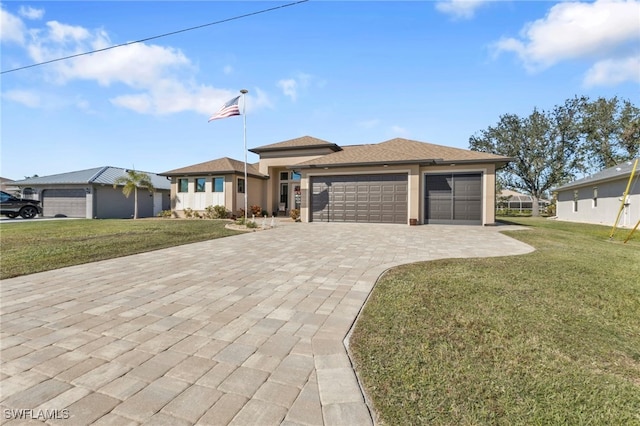 prairie-style house with a garage and a front lawn