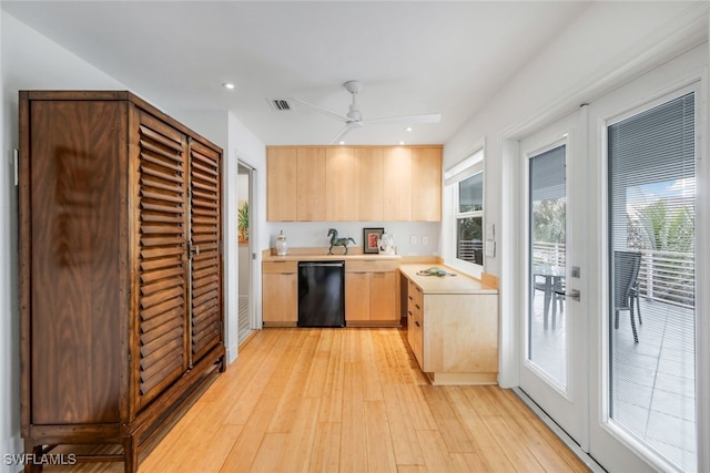 kitchen featuring light wood-type flooring, light brown cabinetry, dishwasher, and ceiling fan