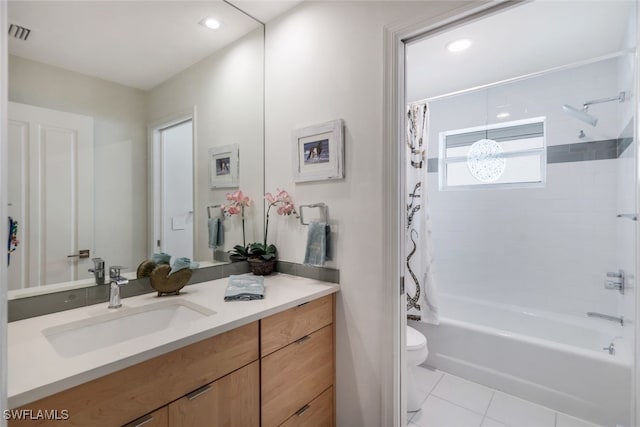 full bathroom with toilet, vanity, shower / bath combo, and tile patterned flooring