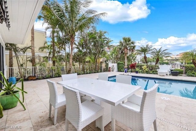 view of swimming pool featuring a patio