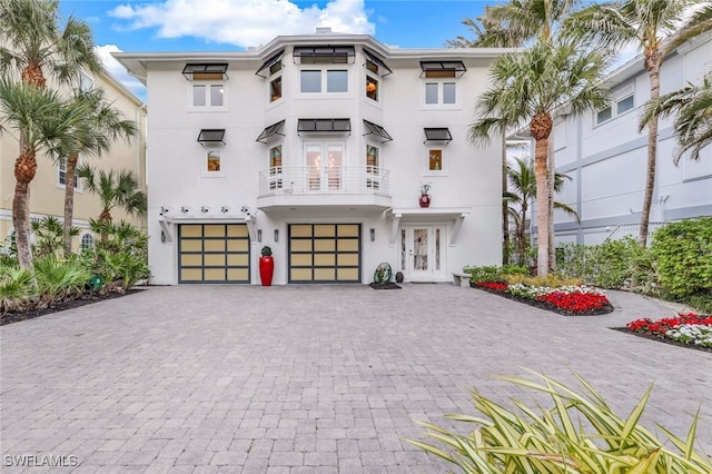 view of front of property with a garage