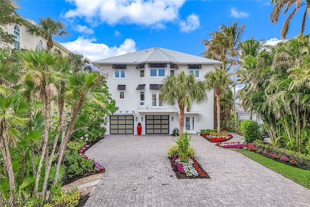 coastal home with a garage