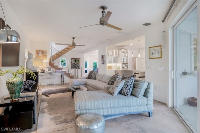 living room featuring ceiling fan