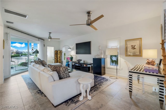 living room featuring ceiling fan