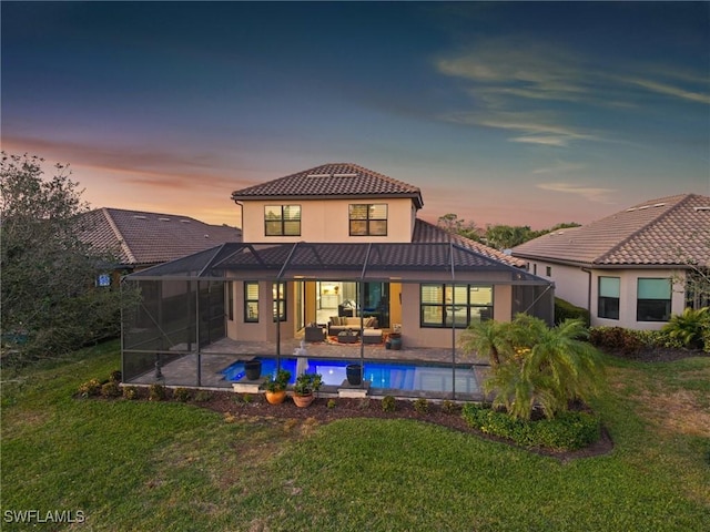 8750 Cavano St E, Naples, FL 34119 - back of house featuring outdoor lounge area, a tile roof, a yard, and an outdoor pool