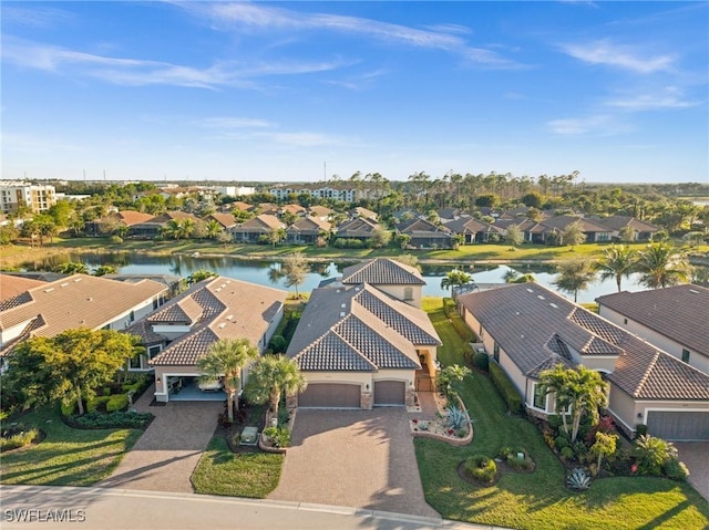 bird's eye view with a water view