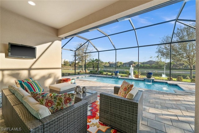 pool featuring a patio, an outdoor living space, and a lanai