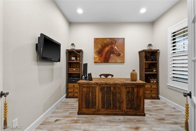 office with recessed lighting, baseboards, and light wood finished floors