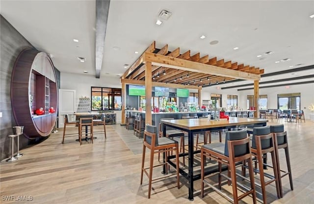 8750 Cavano St E, Naples, FL 34119 - bar area featuring recessed lighting and light wood-style flooring
